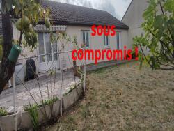 beau-terrain-derriere-la-maison